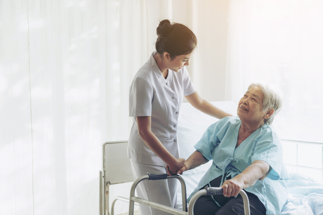 Nurse Taking Care of Old Lady